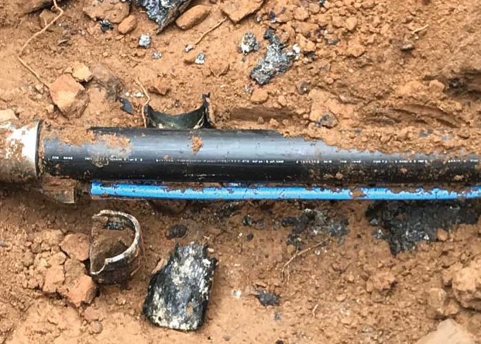pipe bursting denver damaged sewer line exposed in trench for replacement